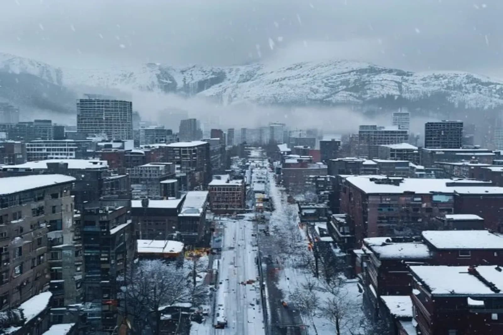 Abbotsford, BC — Fraser Valley winter scene with light coastal snow on residential and commercial property, snow.ca service area — Canada.