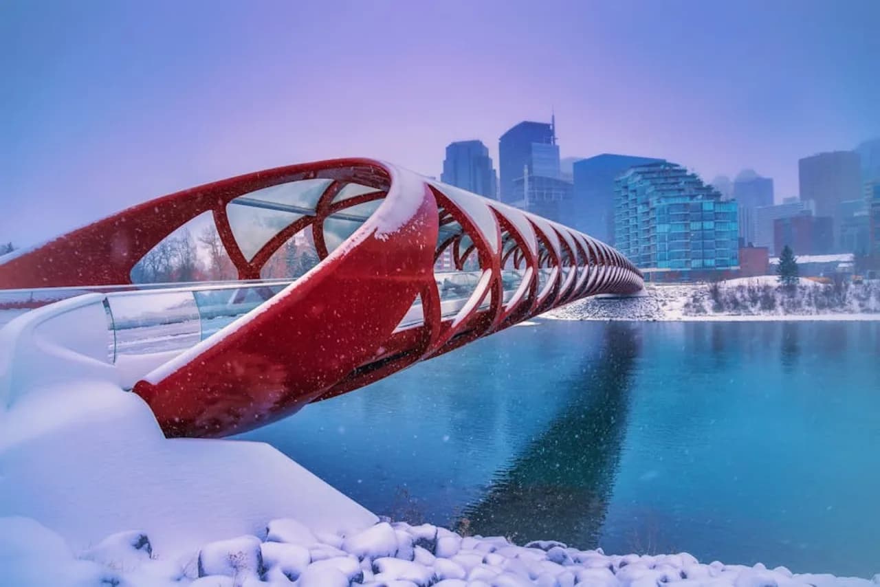 Calgary in winter — downtown skyline with Rockies backdrop — Canada.